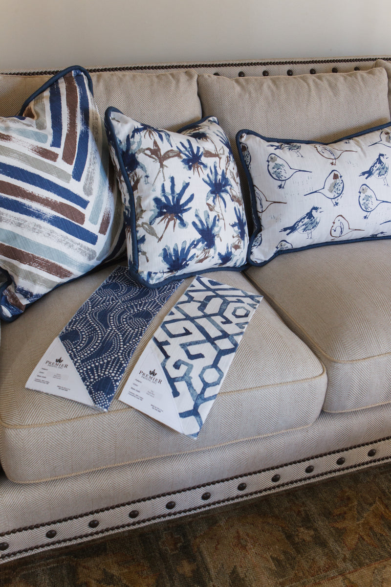 photo of Chinese inspired fabric pillows on couch