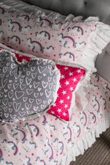 cotton unicorn fabric made into pillows for little girls bedroom decor