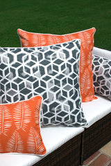 picture of grey and orange pillows made with outdoor fabric