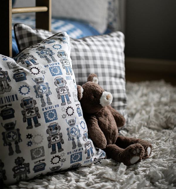picture of robot toy children's fabric with grey plaid fabric in background