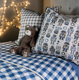photo of robots printed on fabric for bedding in kid's room blue plaid fabric