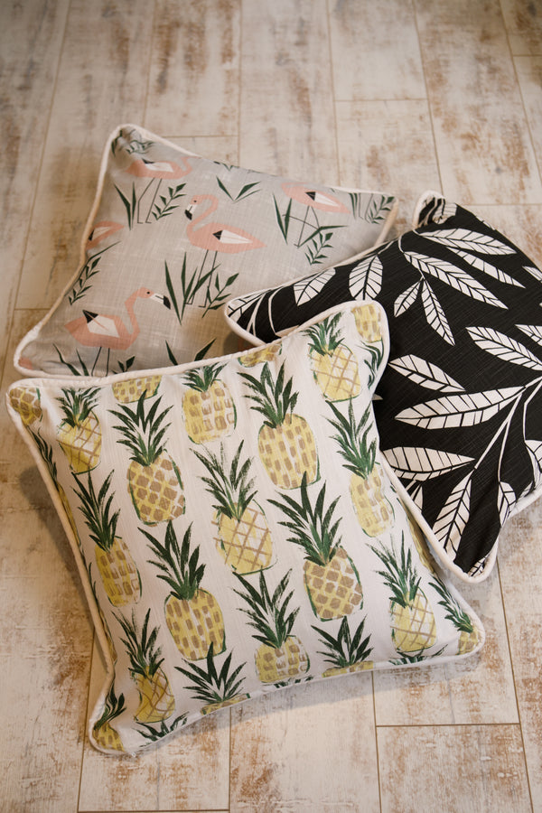 picture of pineapple fabric being used on a pillow premier prints