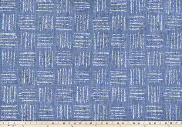 Photo of blue fabric with a square geometric pattern
