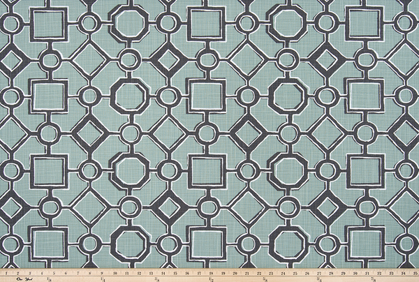 picture of green, black, and white Brazilian pattern inspired fabric