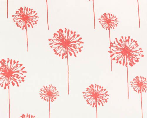 coral colored dandelion flower printed on white fabric