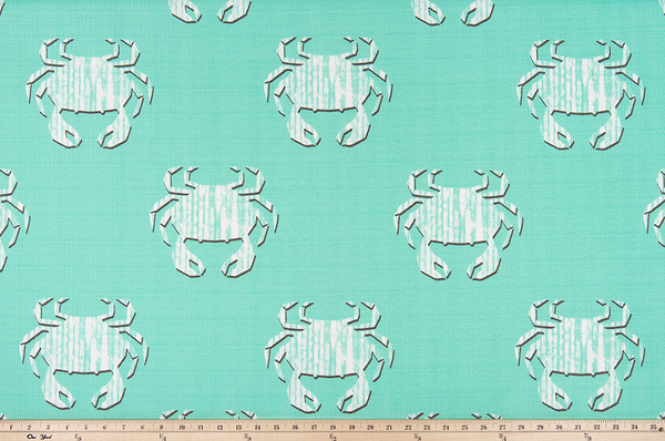 photo of repeating geometric crab pattern fabric perfect for the beach in summertime