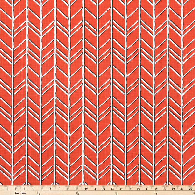 photo of large white herringbone pattern on orange pattern