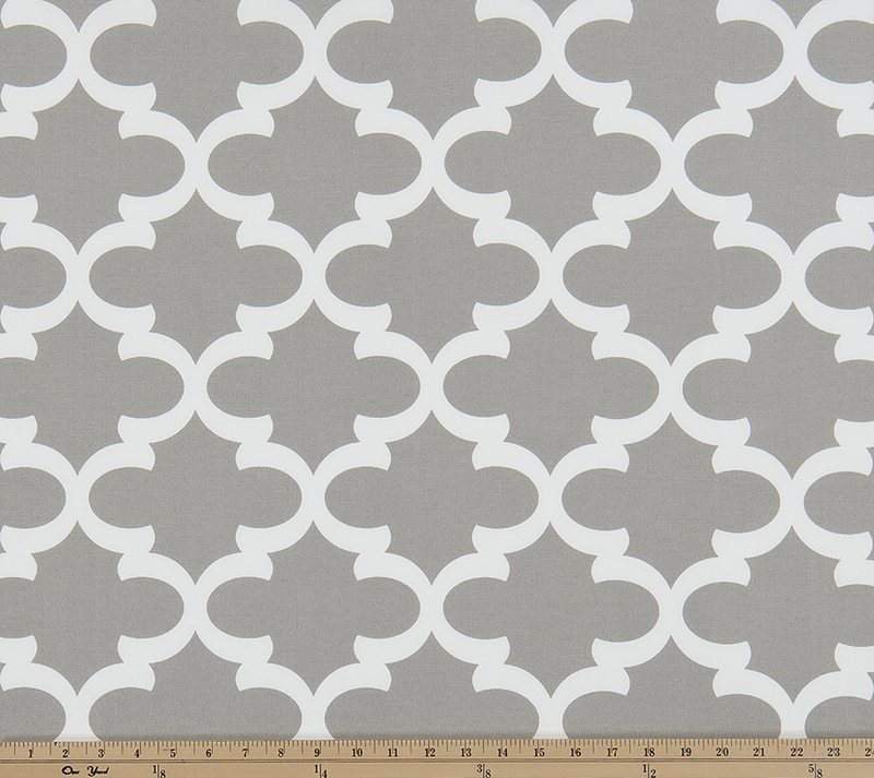 Photo of grey Quatrefoil trellis pattern printed on white fabric