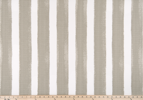 photo of a tan or beige colored striped outdoor fabric 