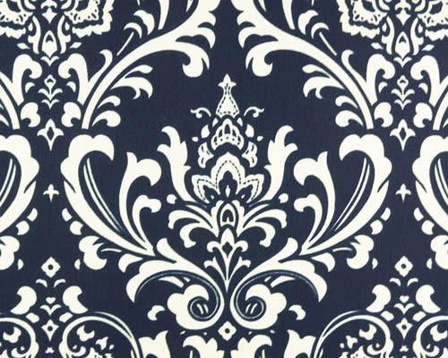 Photo of repeating white Damask pattern printed on navy blue fabric