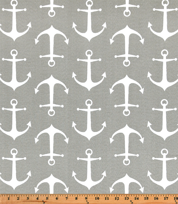 Photo of repeating ship anchor pattern on grey fabric