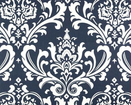 Photo of repeating white Damask pattern printed on blue fabric