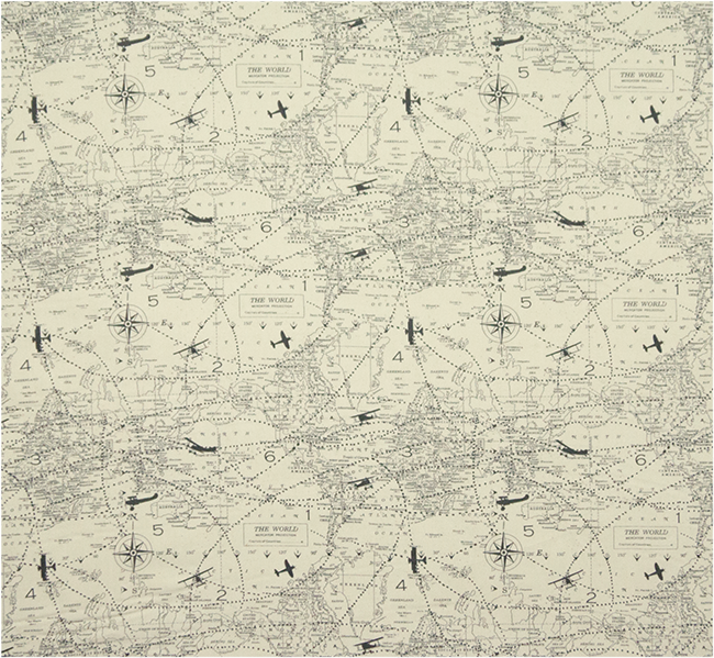 A picture of a printed fabric with airplanes and traveler's map