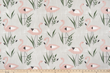 cotton fabric with pink flamingos and green grass