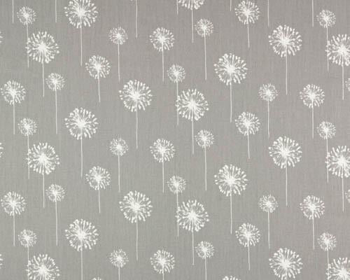 white dandelion flower printed on grey fabric