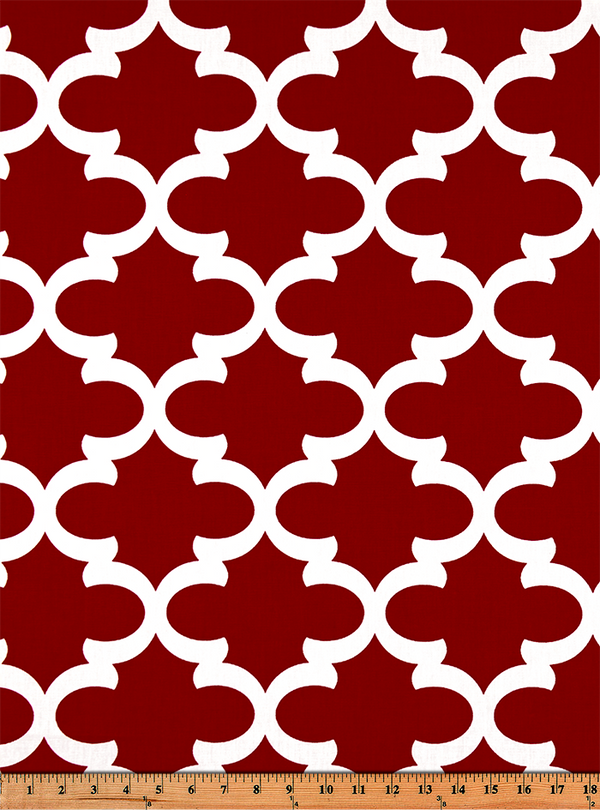Photo of red Quatrefoil trellis pattern printed on white fabric