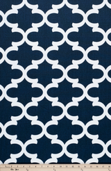 Photo of blue Quatrefoil trellis pattern printed on white fabric