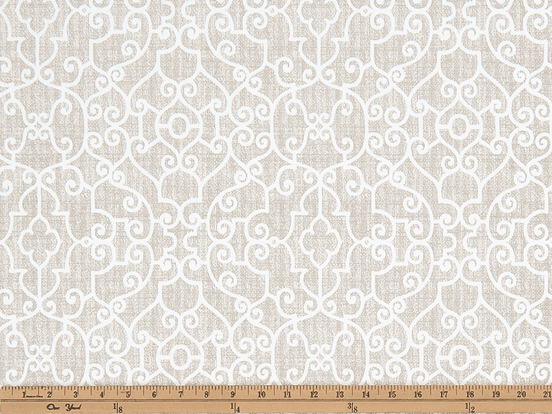Photo of tan elegant geometric scroll design pattern printed on white fabric
