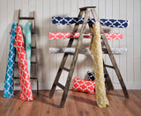 picture of fynn Moroccan trellis lattice pattern fabrics sitting on ladder in modern new york apartment