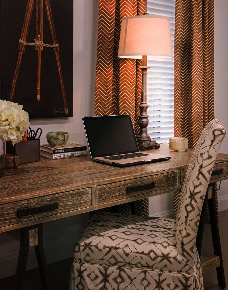 Picture of office decorated with brown chevron and tribal pattern fabrics